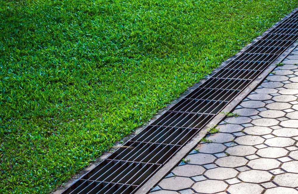 Dealing with Flooding Backyard Drainage Solutions That Work - landscape company metairie - bayou verde